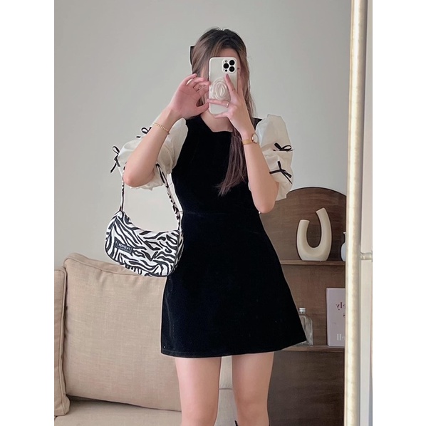 Váy nhung tay voan phồng đính nơ đen