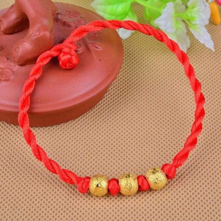 Vòng tay chỉ đỏ 3 hạt vàng