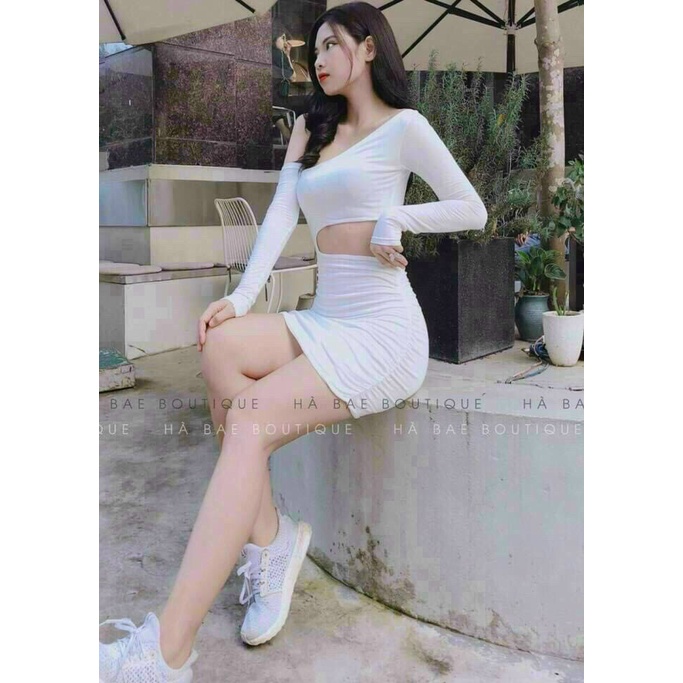 Đầm body tay dài khoét eo sành điệu