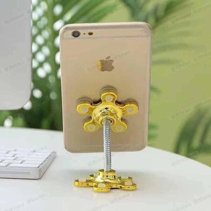 Gía đỡ  điện thoại lò xo hút chân không  giao màu ngẫu nhiên.