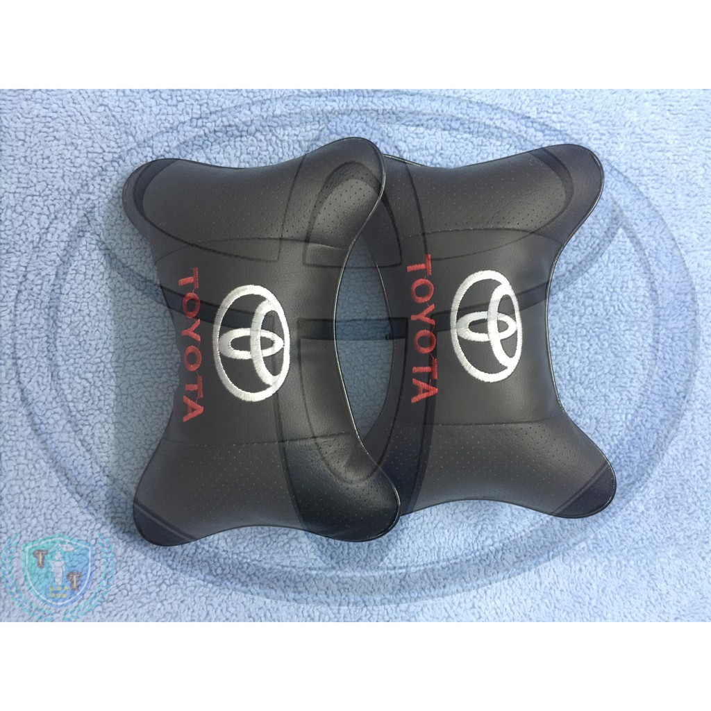 Gối tựa đầu bằng da cho ghế xe ô tô có gắn logo của các hãng xe | BigBuy360 - bigbuy360.vn
