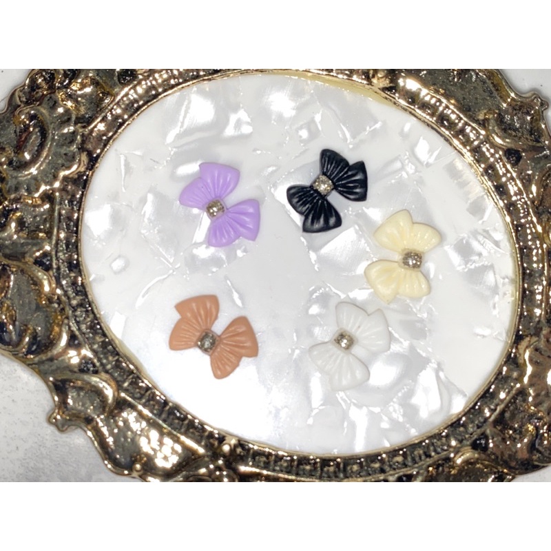 Nơ trang trí móng set 10 viên trắng đen