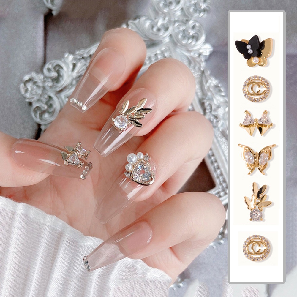 [Hàng mới về] Phụ kiện trang trí móng tay hình nơ 3D ngắn ngọc trai kim cương bằng hợp kim DIY