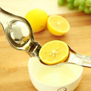 Dụng cụ kẹp, ép nước chanh inox sáng bóng