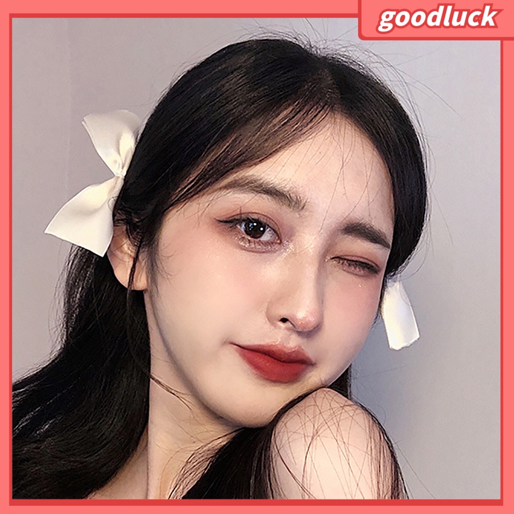 Kẹp tóc hình nơ bướm màu trơn đơn giản dành cho bạn nữ