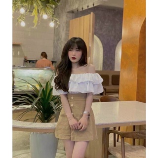 Chân váy lưng cao kiểu lệch tà phối nút