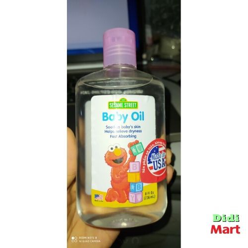 Dầu mát xa cho trẻ sơ sinh Baby Oil - SESAME STREET - Nhập khẩu MỸ