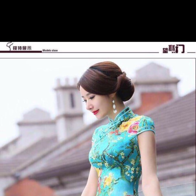 Com bo đầm Xườn xám