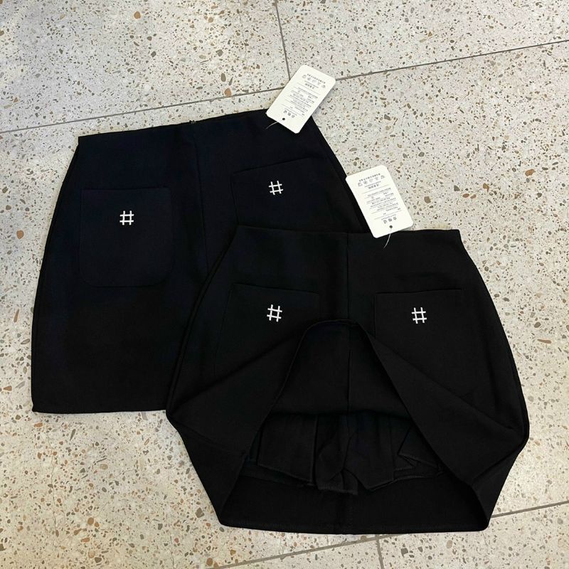 chân váy chữ a phồng túi trước thêu  vải tuyết mưa cạp khóa sau lưng cao có quần bên trong