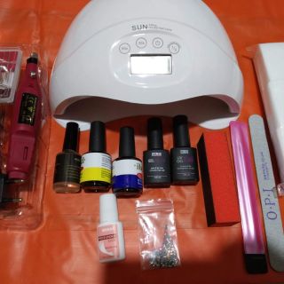 Combo set nail làm sơn gel cơ bản tốt Set gồm 1 máy hơ sun5plus chính hãng. 1 máy mài móng mini khỏe tiện lợi