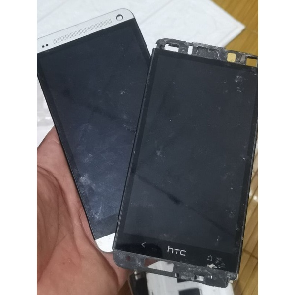 Màn hình điện thoại htc one m7 hàng bóc máy trươc khi gủi sẽ dán tem bảo hanh có lỗi gủi trả cho shop
