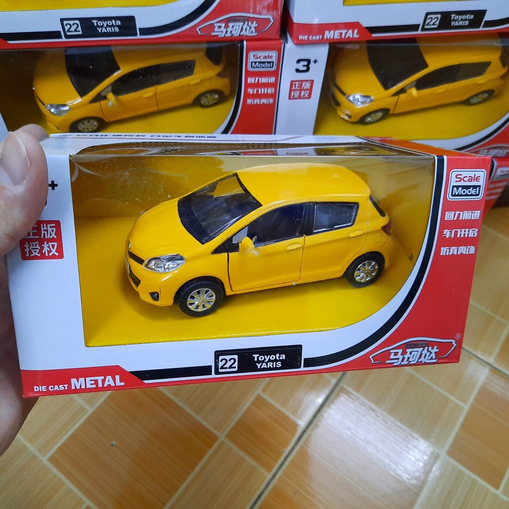 Xe mô hình ô tô RMZ Toyota Yaris tỉ lệ 1:32 xe bằng kim loại mở được cửa