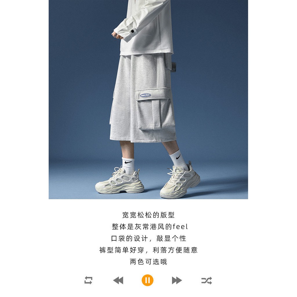 Quần short nam phiên bản Hàn Quốc của xu hướng quần ống rộng cắt xéo phong cách Hong Kong hoang dã thẳng mùa hè mới quần