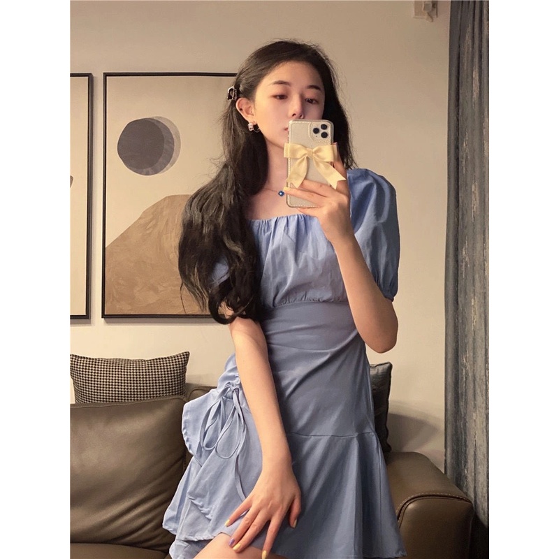 Đầmtrắng xếp ly phối dây rút thiết kế lệch tà cá tính thời trang