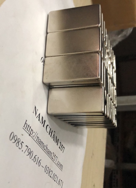 Nam châm đất hiếm lực từ mạnh N52 KT: 50x24x14mm, loại nam châm trắng lực từ sieu mạnh, cẩn thận khi dùng.