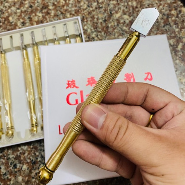 Dao Tay cắt kính
