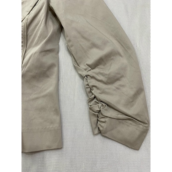 Áo vest Ninomaxx kaki 1 lớp tay lỡ (Dơ nhẹ) - Thanh lý vnxk