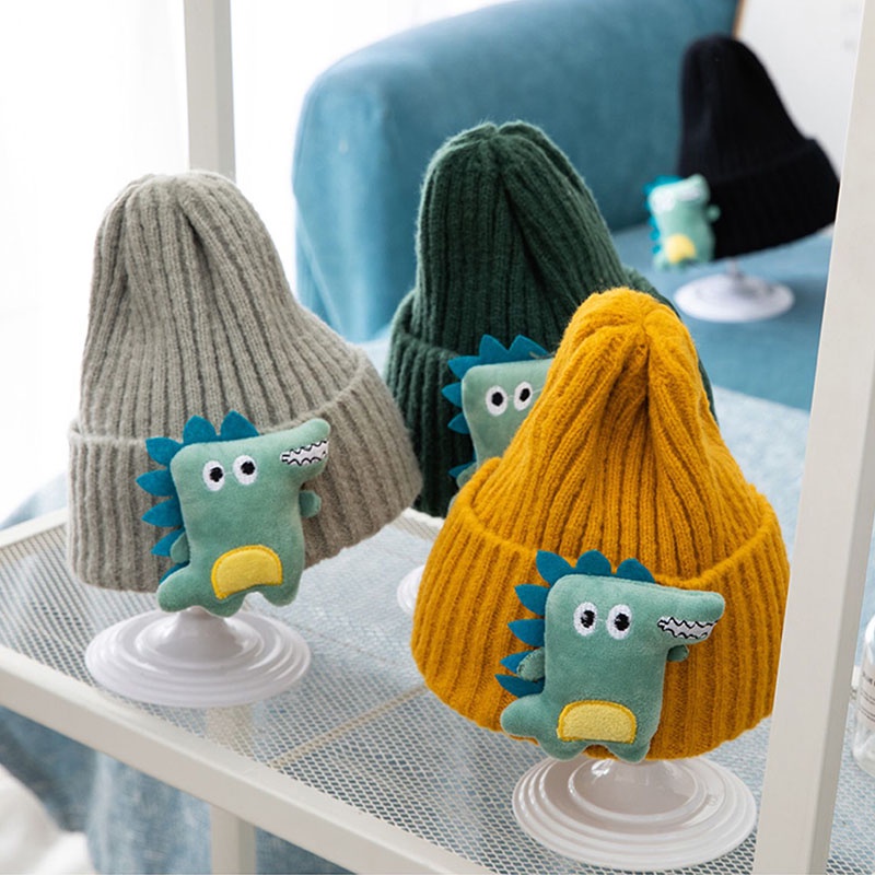 Mũ beanie Giữ Ấm Tai Chống Gió Màu Trơn Hình Khủng Long Hoạt Hình Thời Trang Thu Đông Cho Bé Trai 6-36 Tháng Tuổi