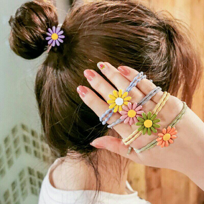 Cột tóc hoa cúc hoạ mi