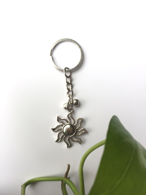 Móc khoá kim loại biểu tượng mặt trời, mặt trăng