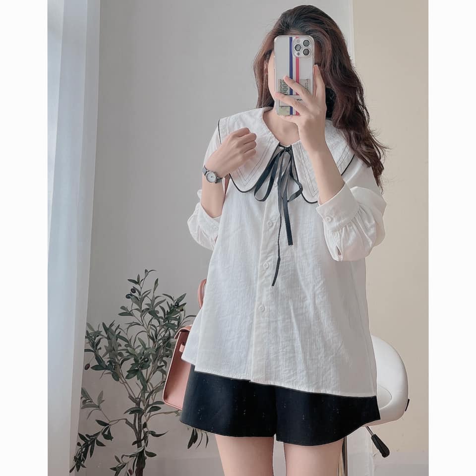 Áo sơ mi cổ viền nơ đen chất đũi xước có 2 màu đi học