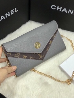 Clutch cầm tay Lv
