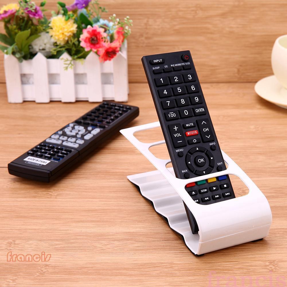 Giá để remote 4 ngăn được làm từ nhựa , dùng sắp xếp điện thoại