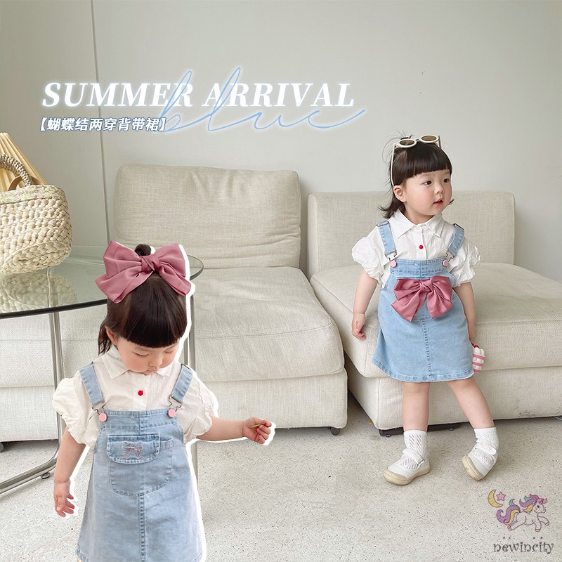 Đầm yếm denim đính nơ thắt xinh xắn thời trang dành cho bé gái