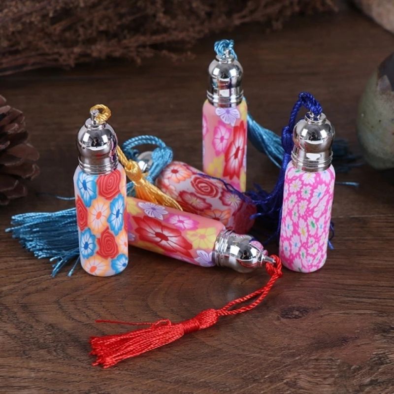 Vỏ chai thủy tinh 6ml chống rơi bể vở bi lăn có dây treo xe ô tô
