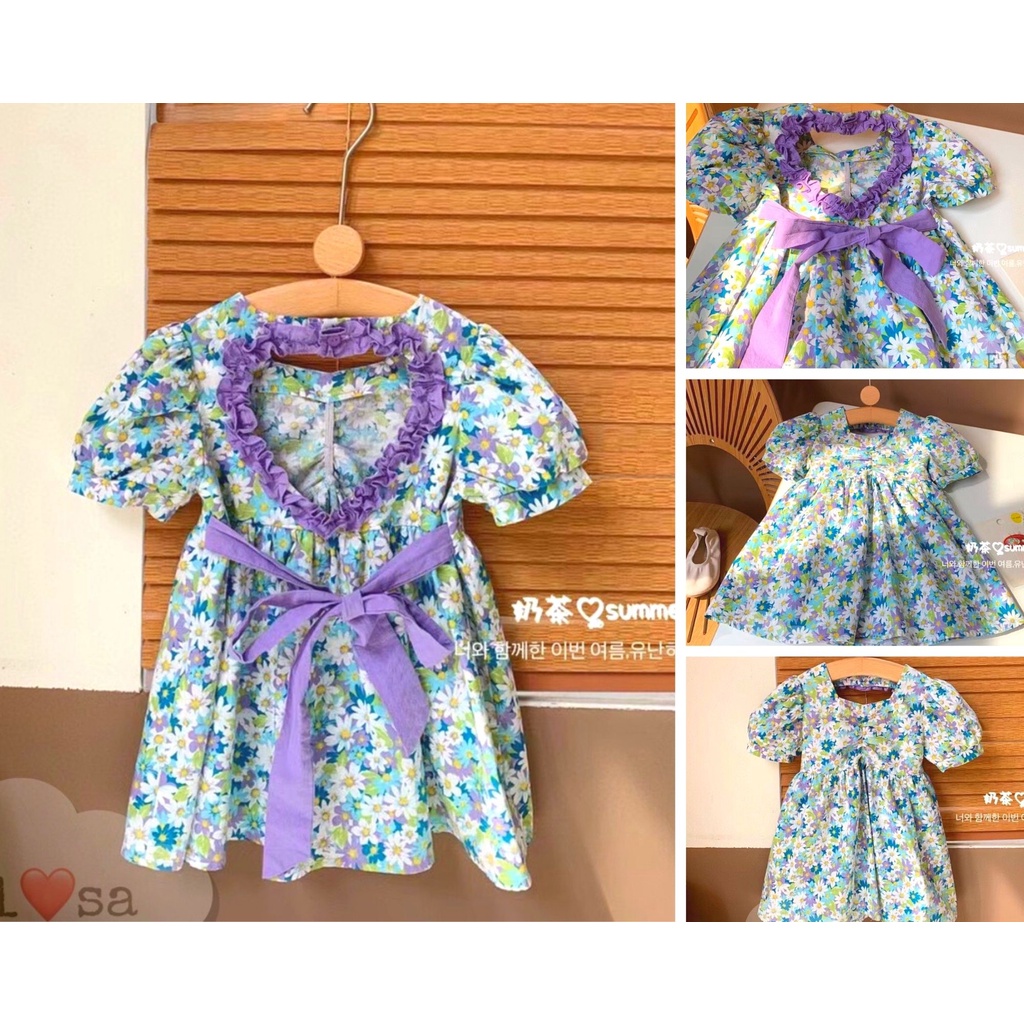 Váy bé gái hở lưng họa tiết hoa cúc kèm nơ lưng màu tím cực cool cho bé diện hè - Váy hoa cho bé