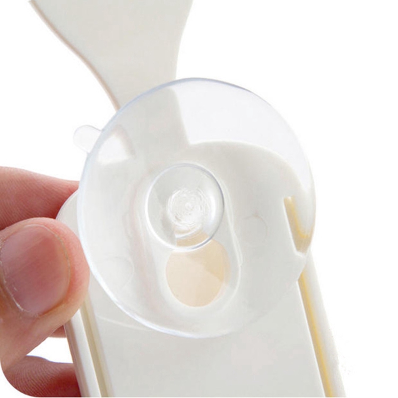 Giá nhựa đựng muỗng xới cơm dán nồi cơm điện bằng đế hút tiện lợi