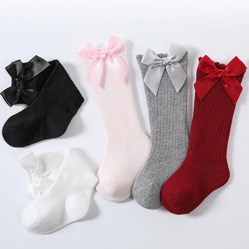 Vớ Cotton Mềm Cao Đến Đầu Gối Chống Trượt Màu Trơn Đính Nơ To Dễ Thương Dành Cho Bé Gái Sơ Sinh