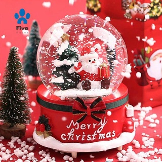Còn hàng Hộp nhạc quả cầu pha lê hình ông già nô en và chữ Merry Christmas