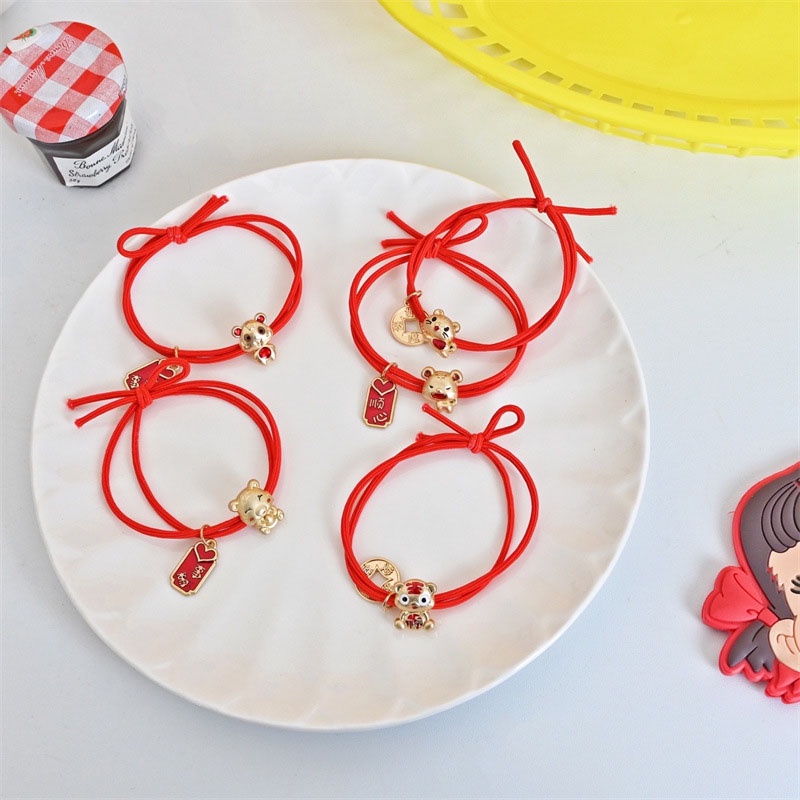 Dây buộc tóc cao su màu đỏ phối mặt hợp kim thời trang