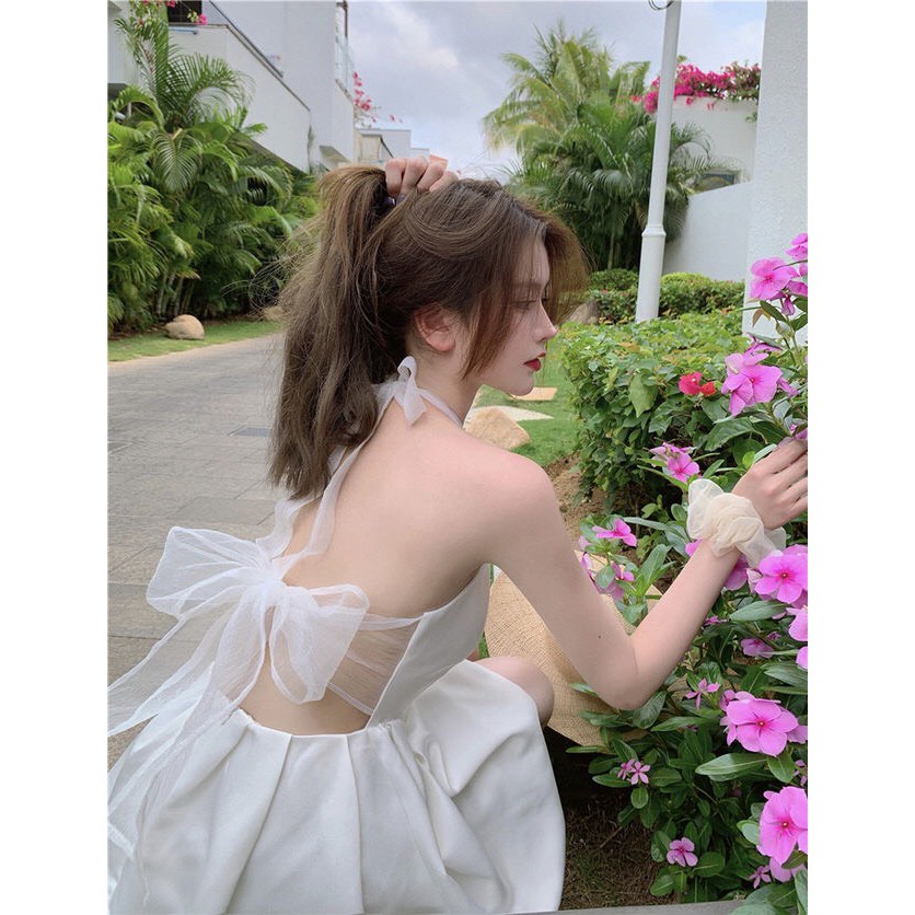 Váy đầm xòe trắng ngắn thắt nơ hở lưng bồng bềnh