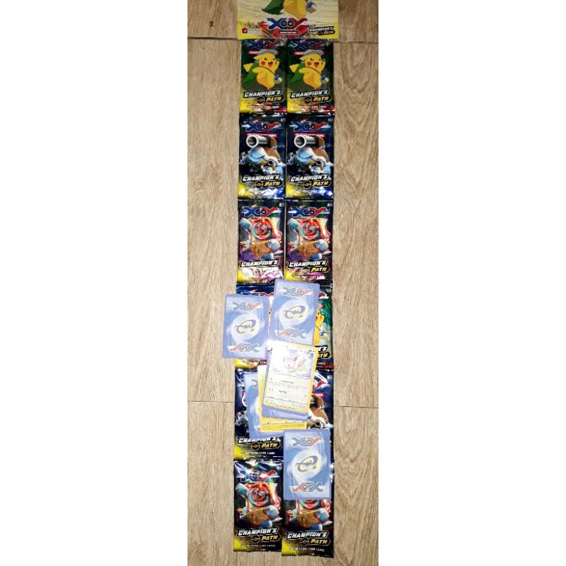 sét 12 pack có 96 thẻ bài Pokemonn_Champion Path VMax bằng giấy bóng cứng óng ánh tiếng Anh