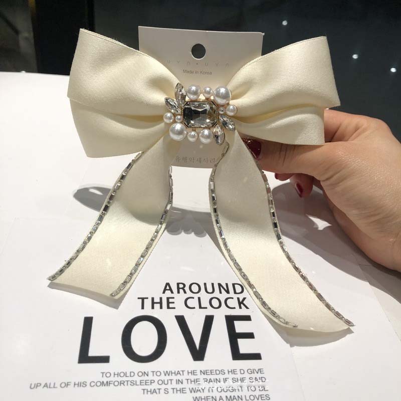 Kẹp Tóc Hình Nơ Đính Ngọc Trai Thời Trang Cho Nữ