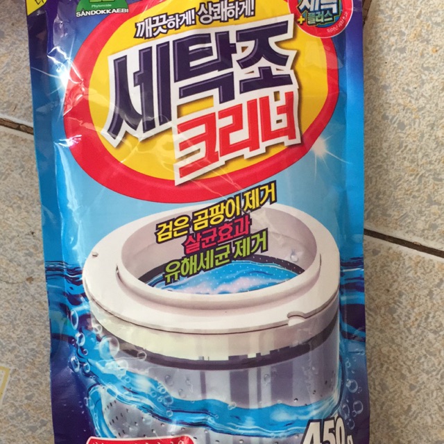 Bột và nước thông lồng máy giặt