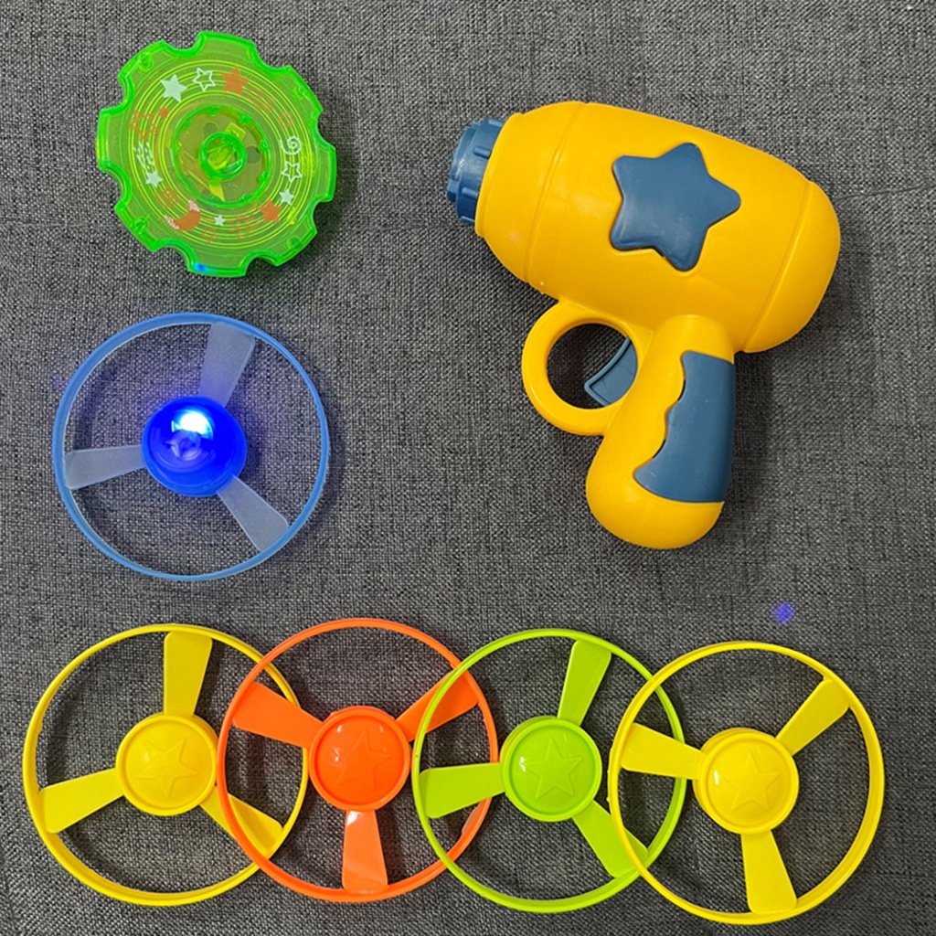 Chong chóng phát sáng, con quay phát sáng bộ 1 súng, 4 chong chóng, 1 con quay nhiều màu sắc vui nhộn cho bé