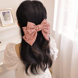 Kẹp tóc nơ hoa nhí tiểu thư