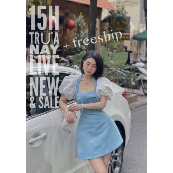 Đầm tafta cổ vuông cutout lưng tay trắng phồng
