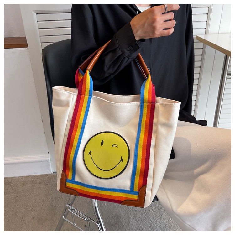 Túi xách mặt cười quai dài