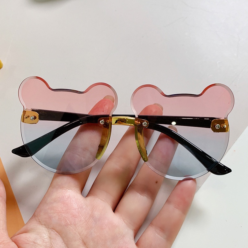 Kính mát gọng tròn màu trơn chống tia UV400 thời trang cho bé