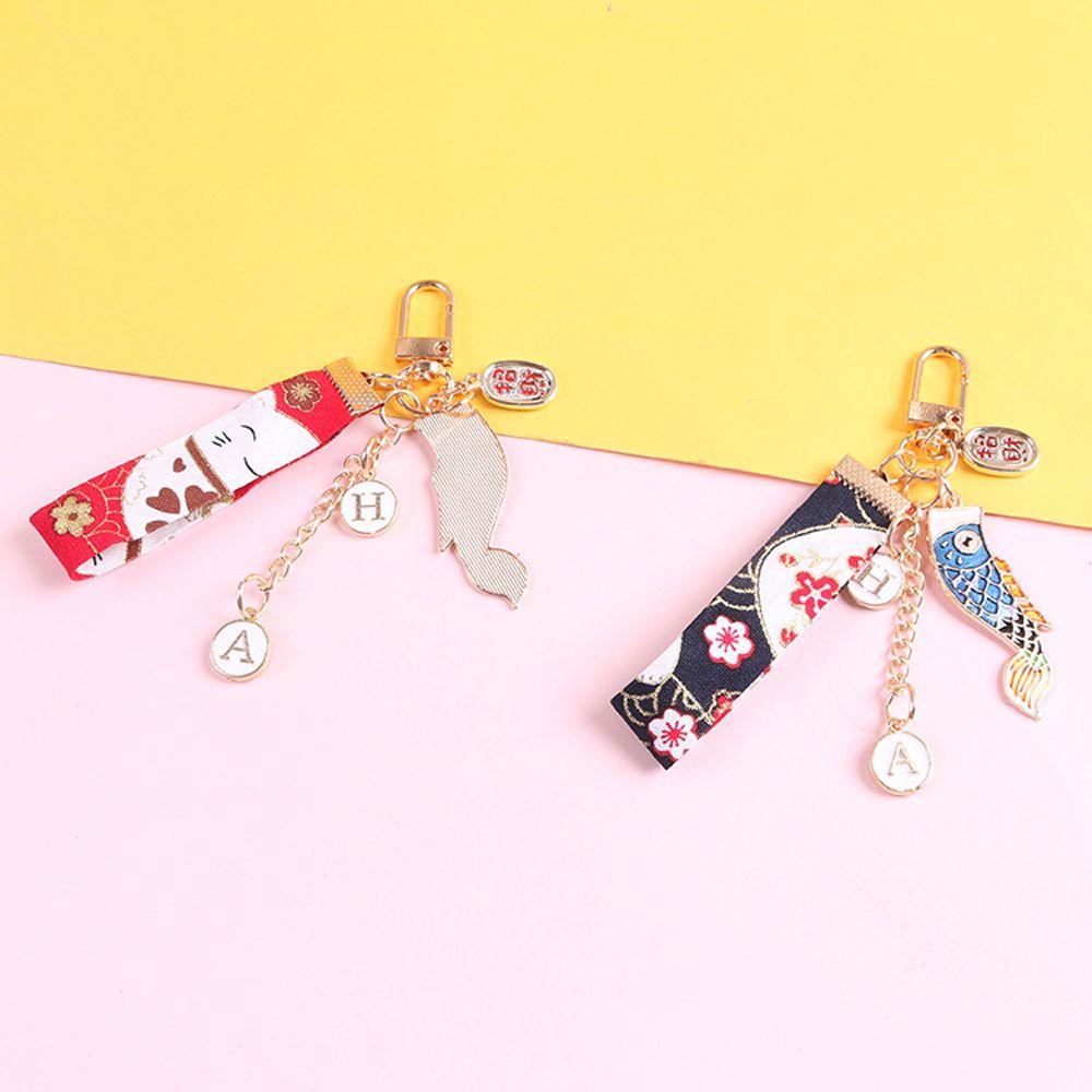 Móc Khóa Hình Mèo May Mắn Thắt Nơ Xinh Xắn