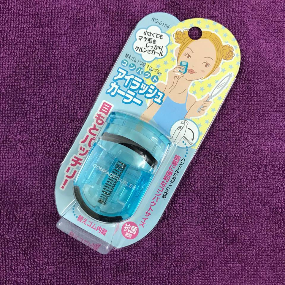 Kết quả hình ảnh cho Uốn mi cong thân nhựa KAI màu xanh"