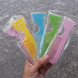 Lược chải tóc bỏ bóp cán hình con vật (kích thước:14cm)