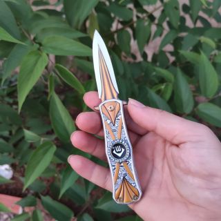 Dao gấp spinner xoay 360