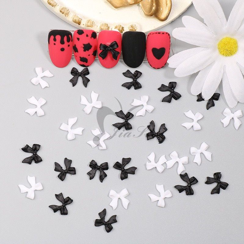 Set charm nơ đính móng đen trắng nail