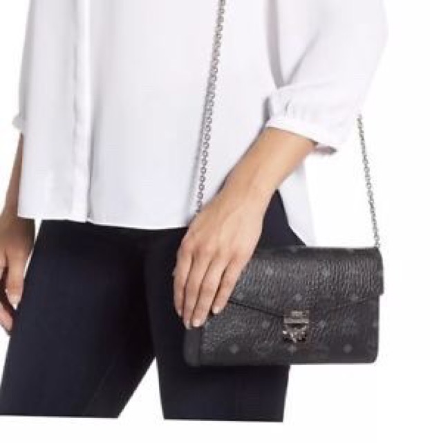 Clutch màu đen , bò