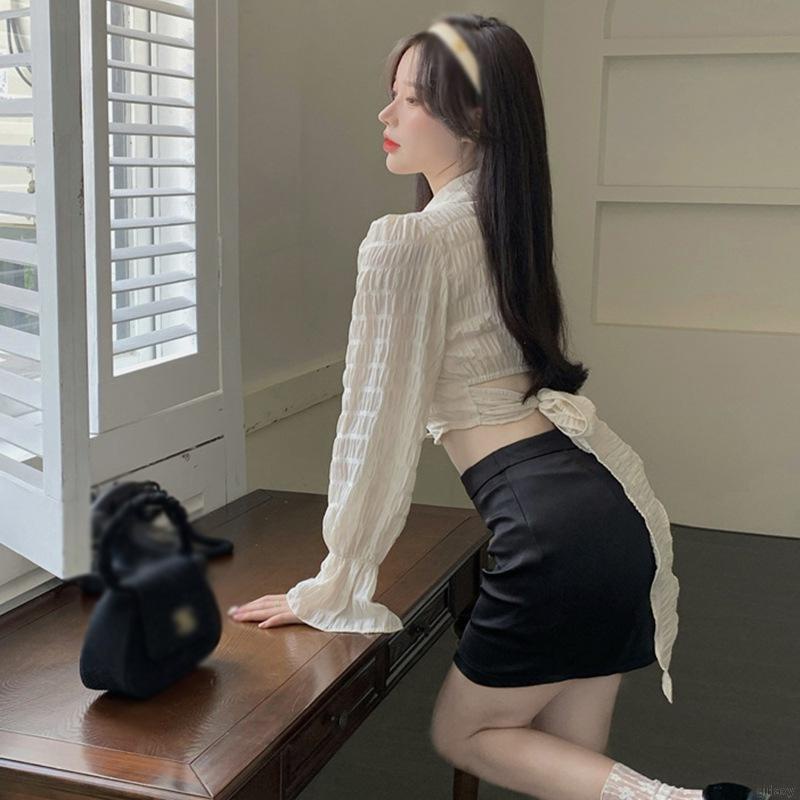Áo sơ mi tay dài phối nơ hở lưng phong cách Hàn Quốc cho nữ